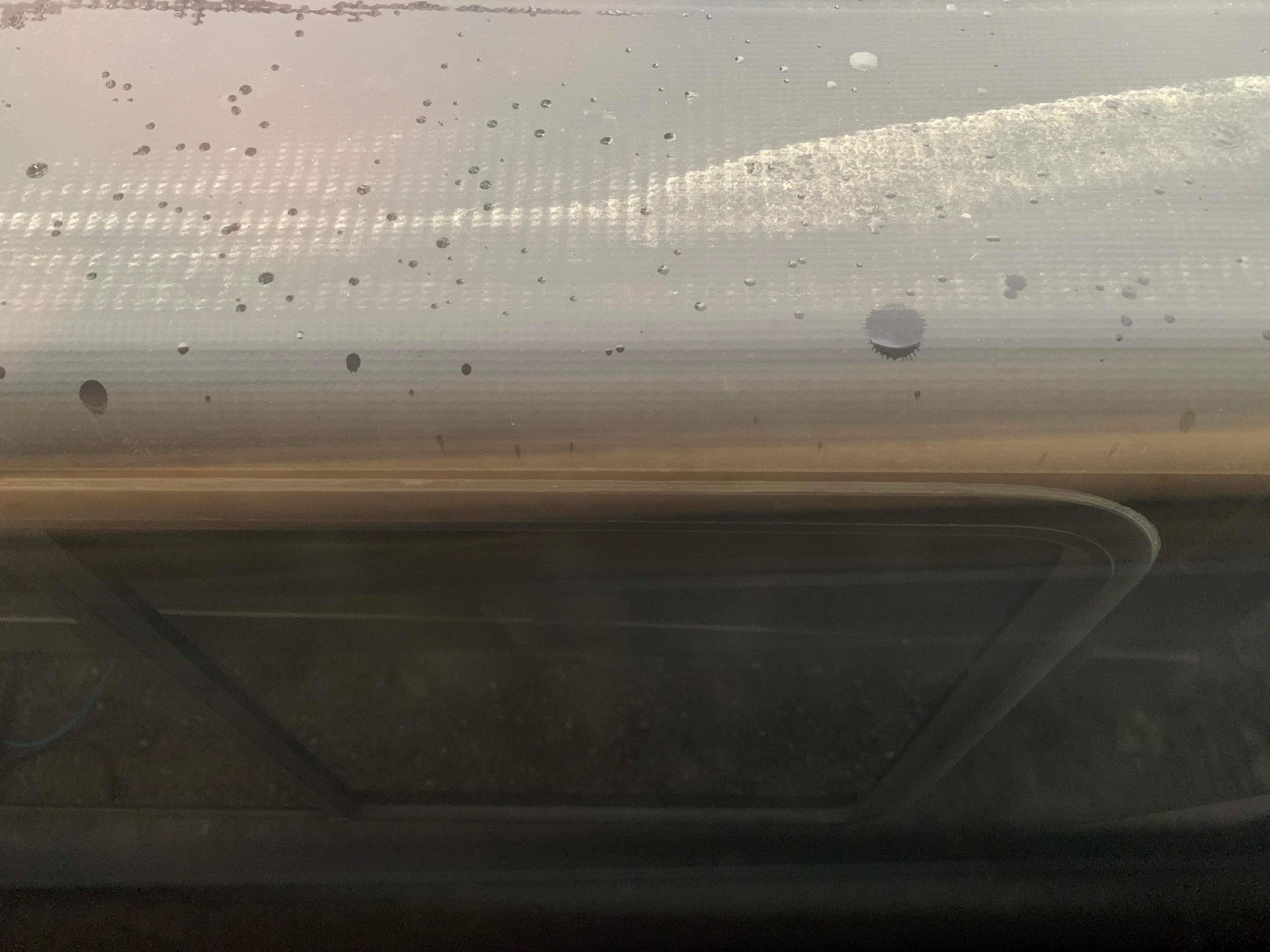 Our view of the top of their slide from our bedroom window . . . only inches between them!
